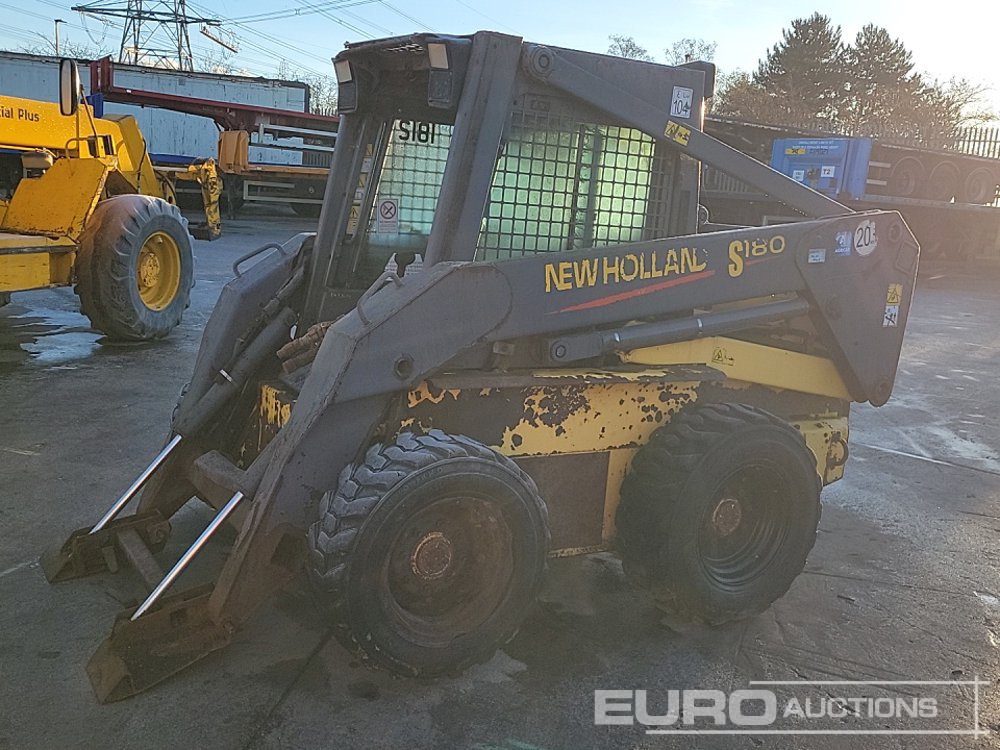 New Holland LS180 - 스키드 스티어 로더 : 사진 1 New Holland LS180 - 스키드 스티어 로더 : 사진 1