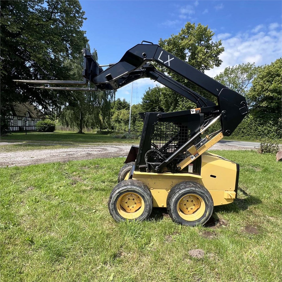 New Holland LX465 - 스키드 스티어 로더 : 사진 4 New Holland LX465 - 스키드 스티어 로더 : 사진 4