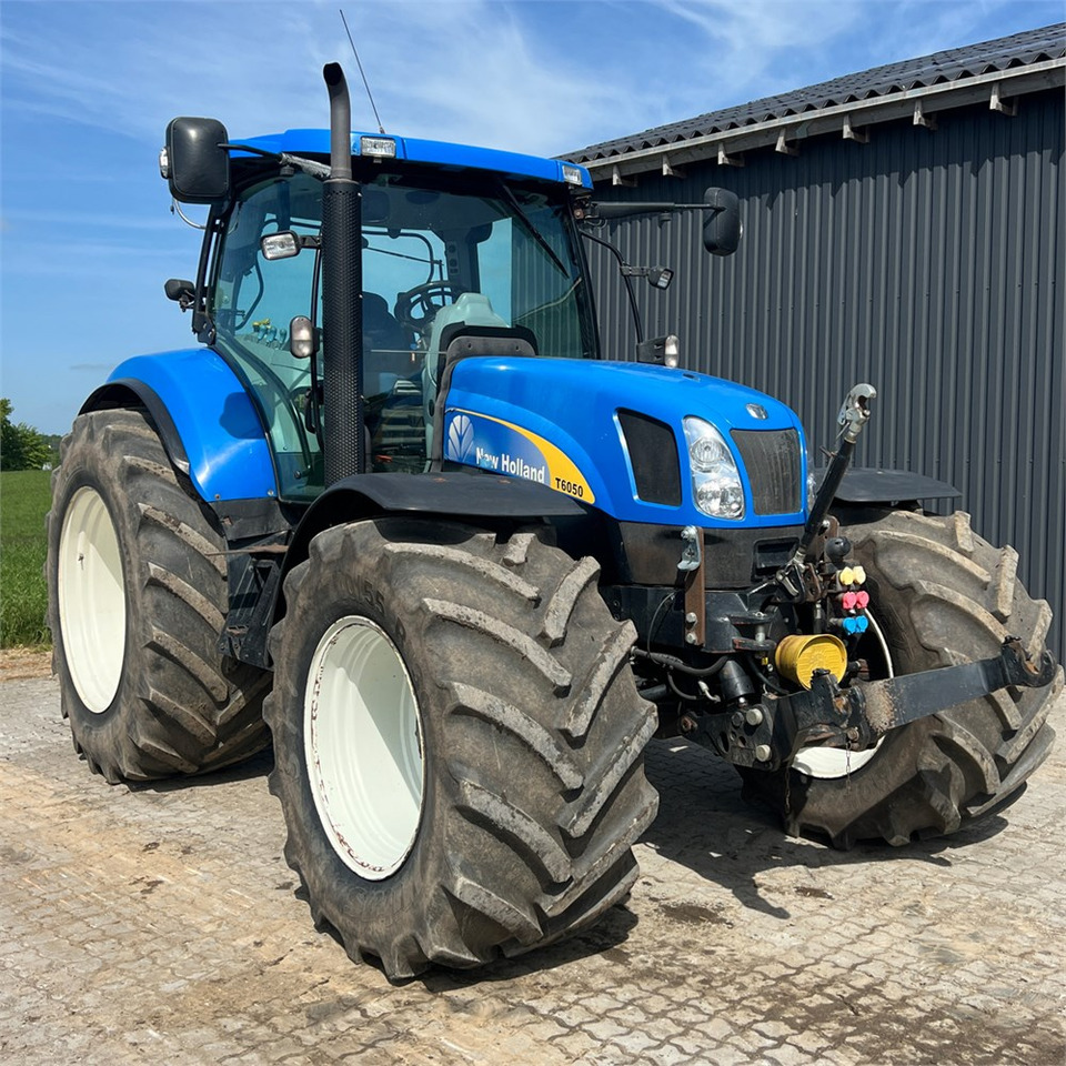 New Holland T6050 - 장궤형 트랙터 : 사진 1 New Holland T6050 - 장궤형 트랙터 : 사진 1