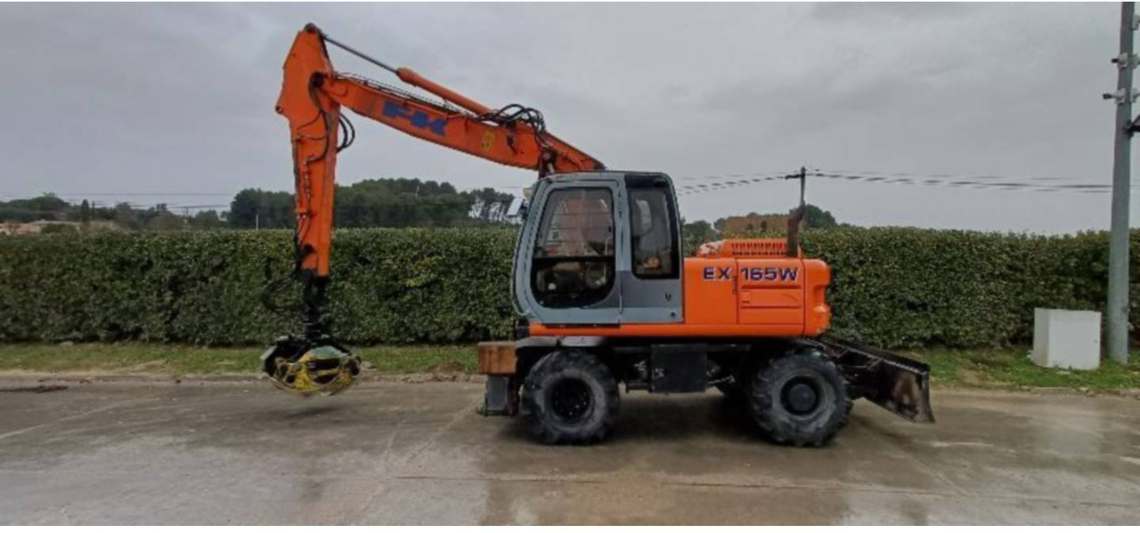 FIAT ALLIS / NEW HOLLAND EX165W - 휠 굴삭기 : 사진 1 FIAT ALLIS / NEW HOLLAND EX165W - 휠 굴삭기 : 사진 1