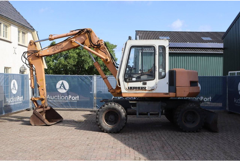 Liebherr A 310 - 휠 굴삭기 : 사진 2 Liebherr A 310 - 휠 굴삭기 : 사진 2