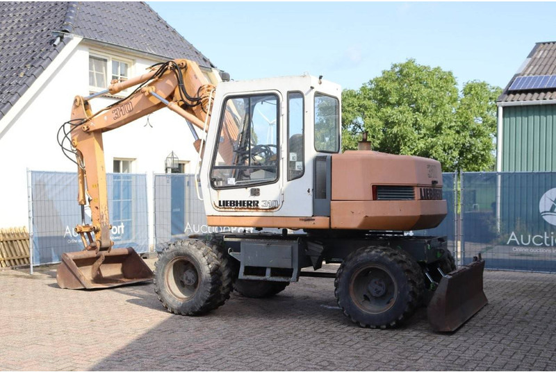 Liebherr A 310 - 휠 굴삭기 : 사진 3 Liebherr A 310 - 휠 굴삭기 : 사진 3