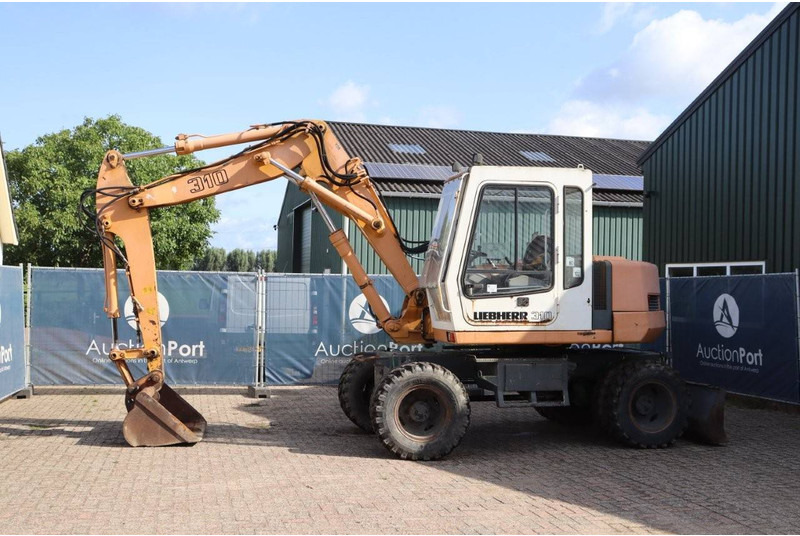 Liebherr A 310 - 휠 굴삭기 : 사진 1 Liebherr A 310 - 휠 굴삭기 : 사진 1