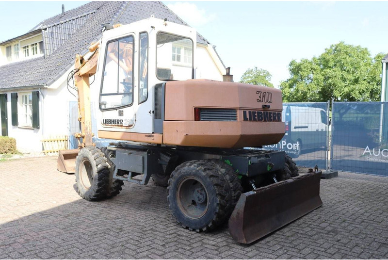 Liebherr A 310 - 휠 굴삭기 : 사진 4 Liebherr A 310 - 휠 굴삭기 : 사진 4